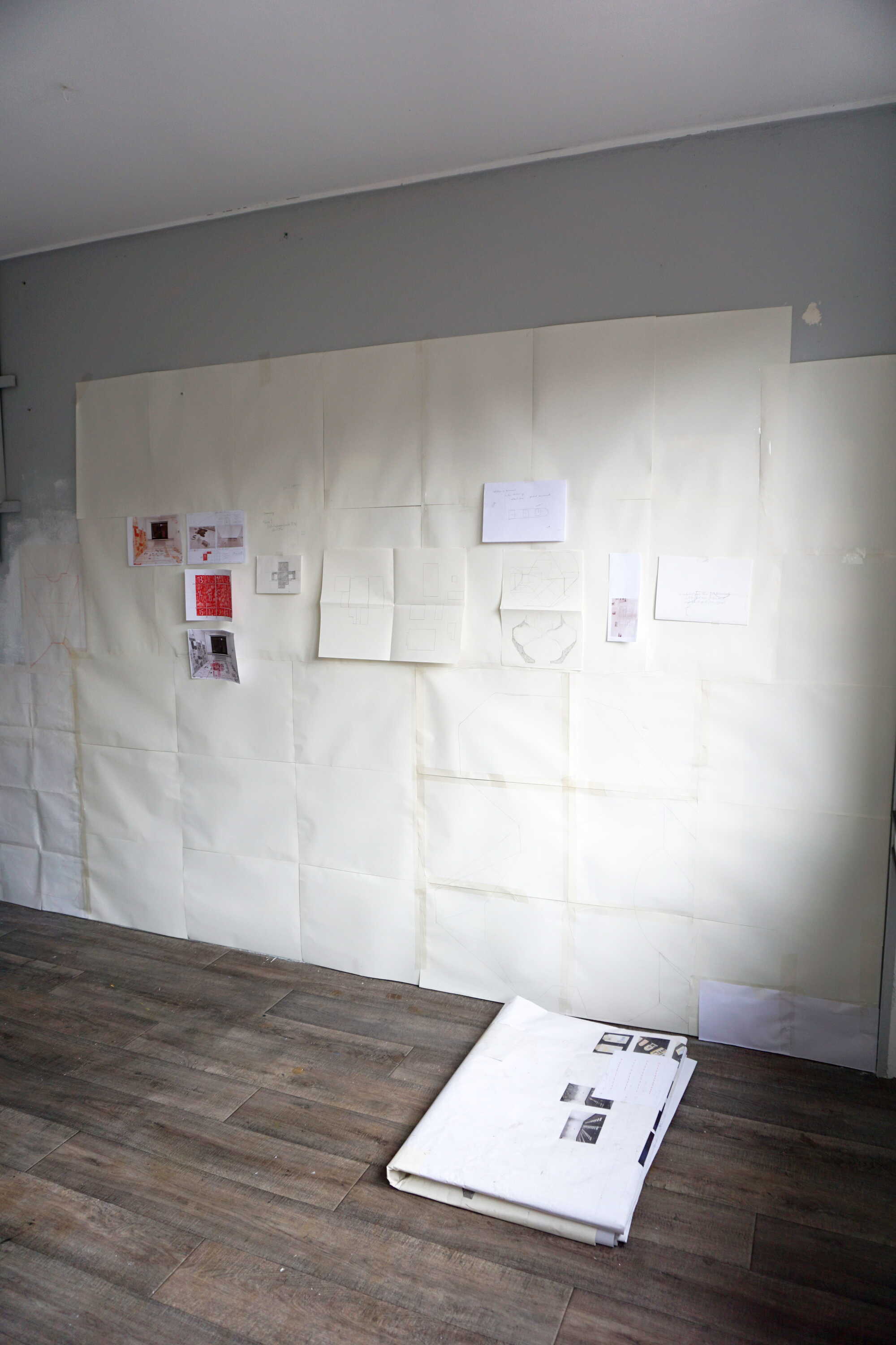 wall installation (spatial transportation)  - wall paper with group of drawings / folded space on the floor